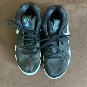 Nike Kyrie Irving men’s basketball sneakers.  Sized 11.  Used